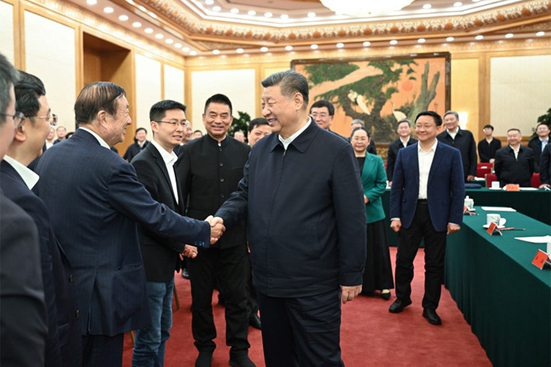 President Xi Jinping talks with private business leaders at a symposium in Beijing Monday. Photo: Xinhua