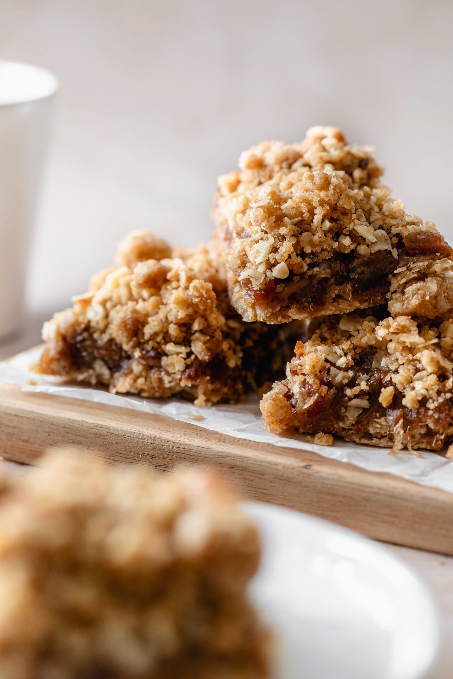 Vegan date walnut bars on a wooden board