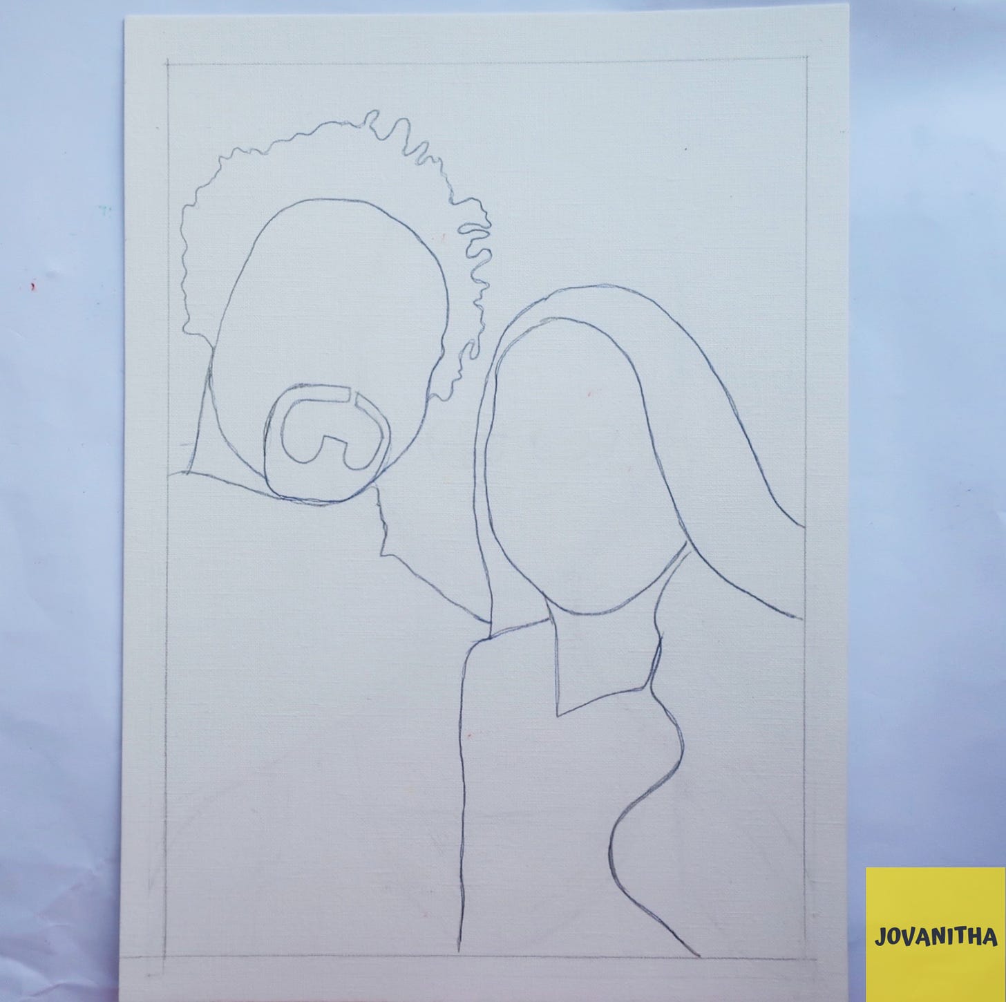 A drawing of two faceless portraits