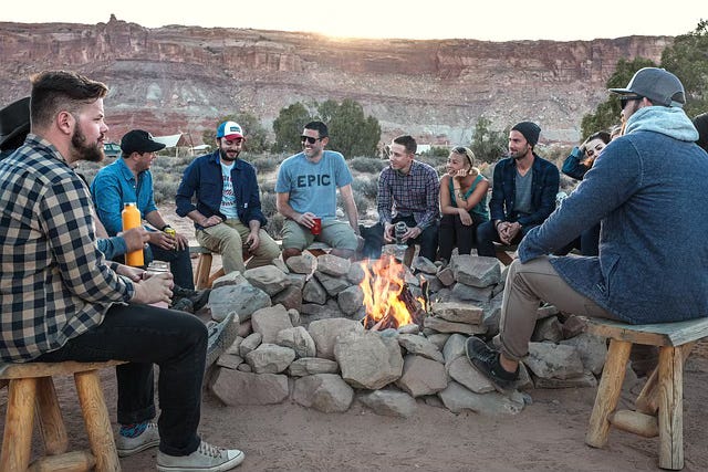 friends around campfire