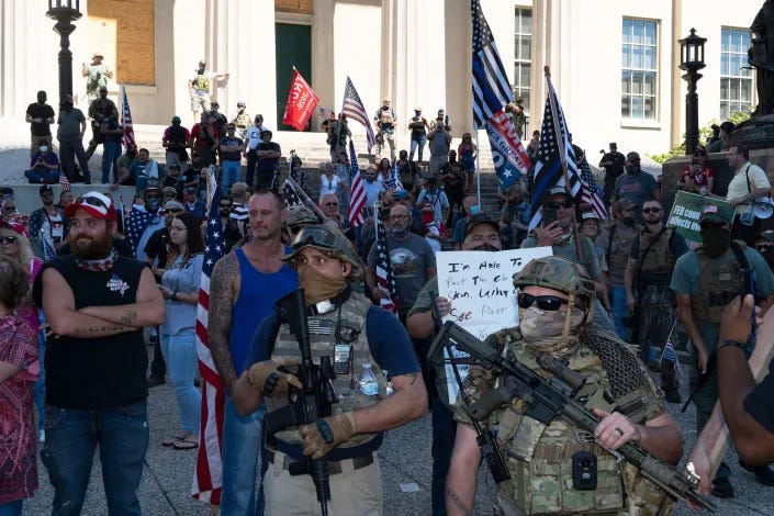 2020. Louisville, Kentucky. USA. A right-wing group gathers at Jefferson Square, the site of the Breonna Taylor memorial at Louisville. Angry but ultimately nonviolent confrontations with BLM and NFAC ensued before the right wing militia pulled back.
