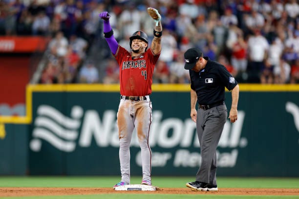 Ketel Marte of the Arizona Diamondbacks celebrates after stealing second base in the third inning against the Texas Rangers during Game One of the...