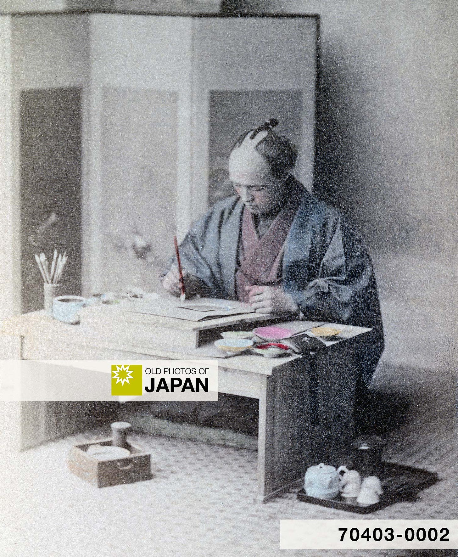Japanese colorist at work, ca. 1865–1875