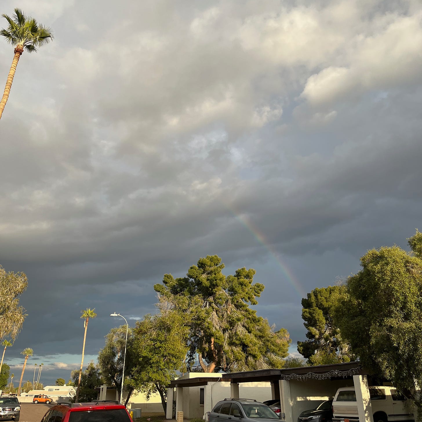 dark clouds and a partial rainbow I saw from my house last week, just after getting a rejection.