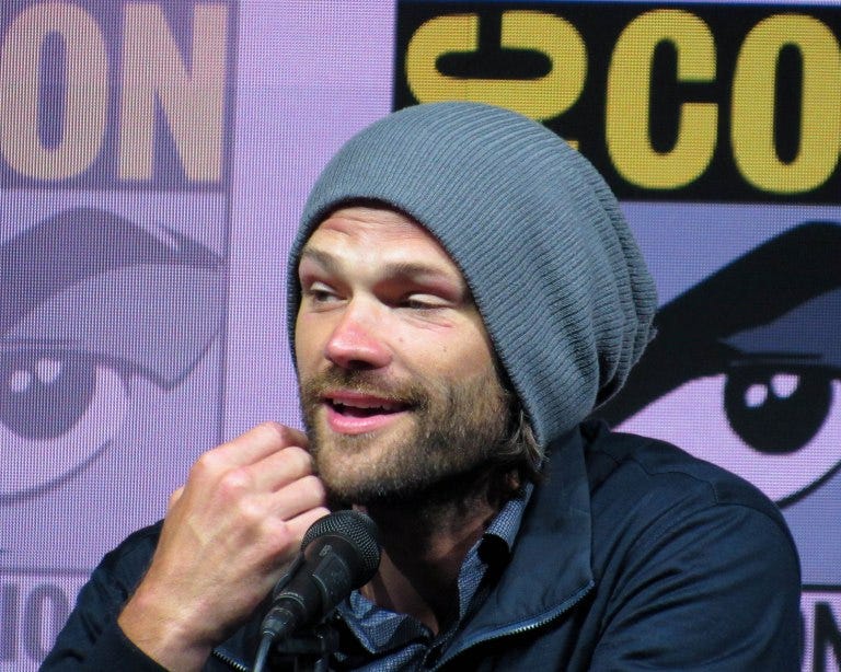 jared padalecki stroking his beard at comic con 2018