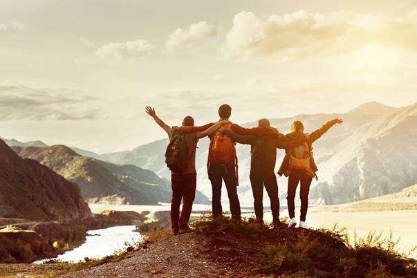 A group of people standing on a hill with their arms raised
AI-generated content may be incorrect. A group of people standing on a hill with their arms raised
AI-generated content may be incorrect.