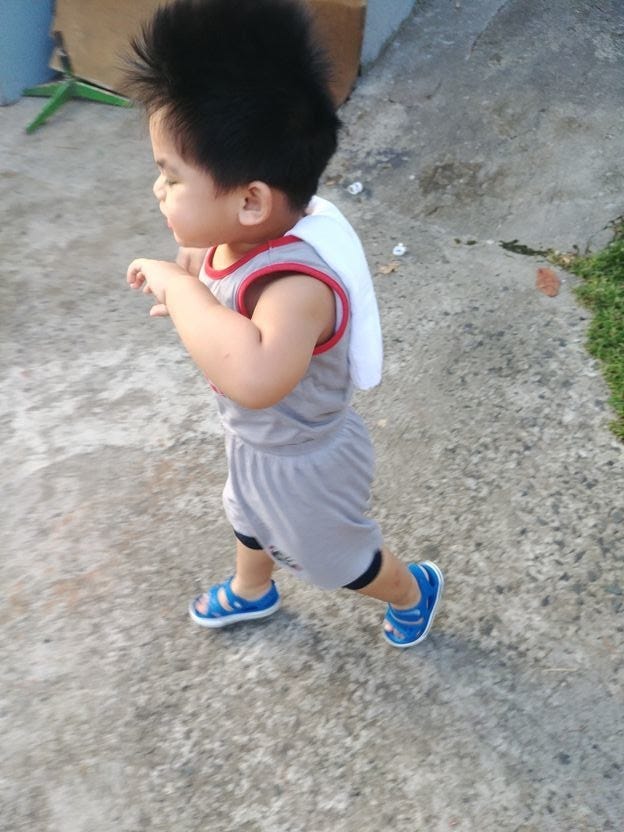 Baby boy enjoying unlimited playtime or Unli Dapa