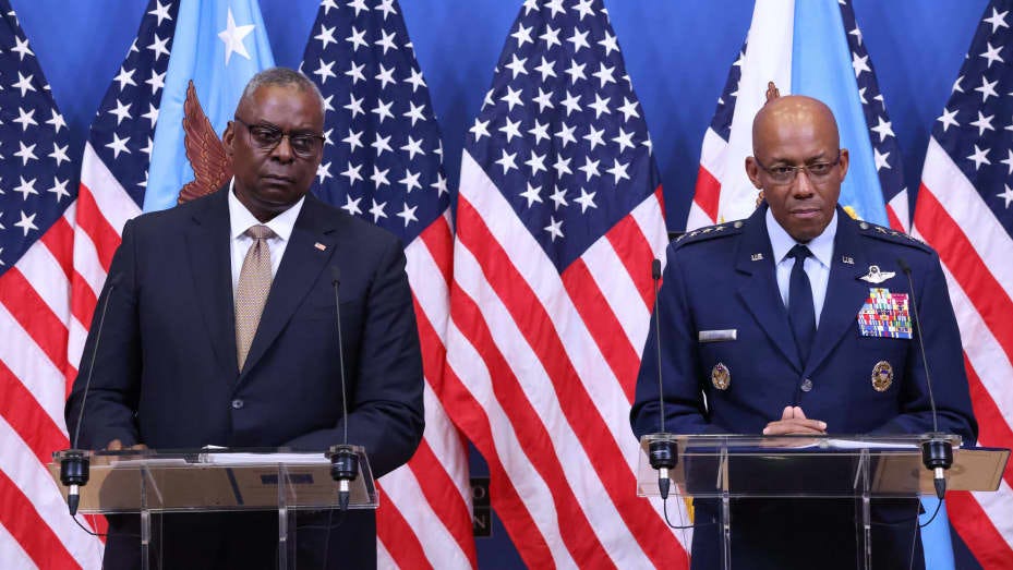 US Air Force general Charles Quinton Brown Jr. (R) and US Defence Secretary Lloyd Austin speaks (L) attend a press conference at the NATO headquarters in Brussels, on October 11, 2023. (Photo by SIMON WOHLFAHRT / AFP) (Photo by SIMON WOHLFAHRT/AFP via Getty Images)
