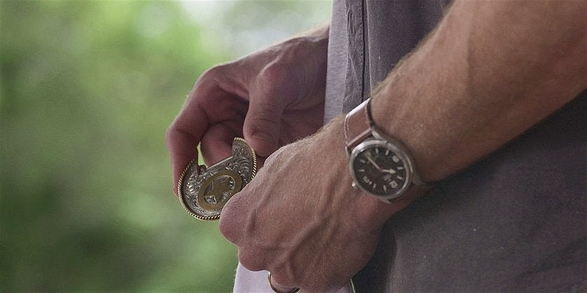 WAlker Cordell still holding his Texas Rangers belt buckle.