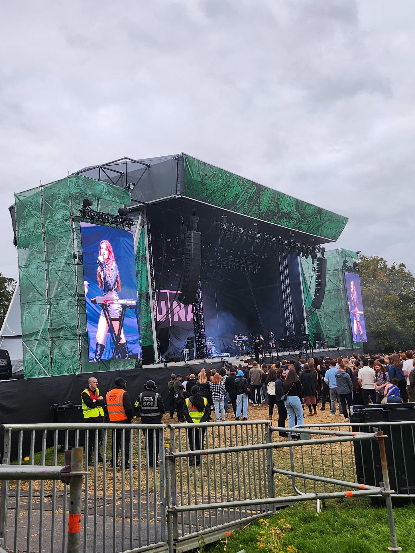 Situated just outside the Gold Circle, the accessible viewing platform has an almost VIP of the main stage, which shows the band MUNA is full performance mode
