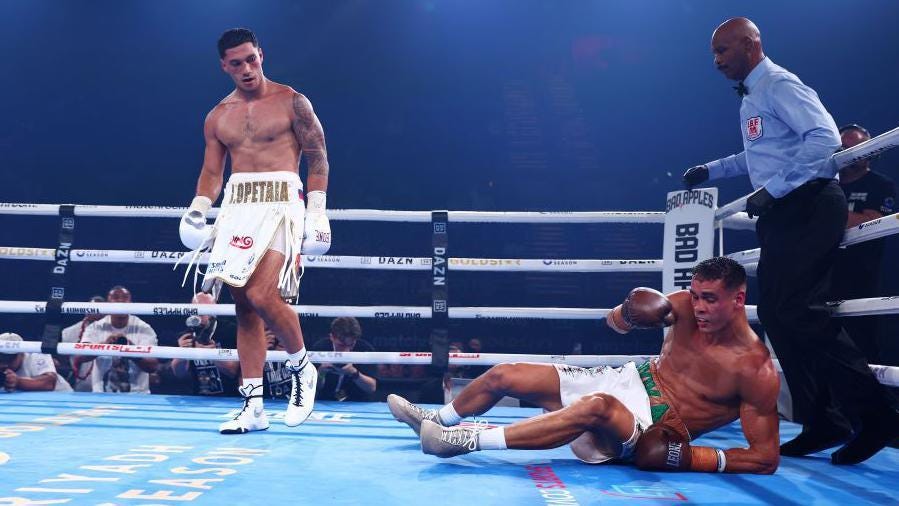 David Nyika on the canvas after being knocked down by Jai Opetaia