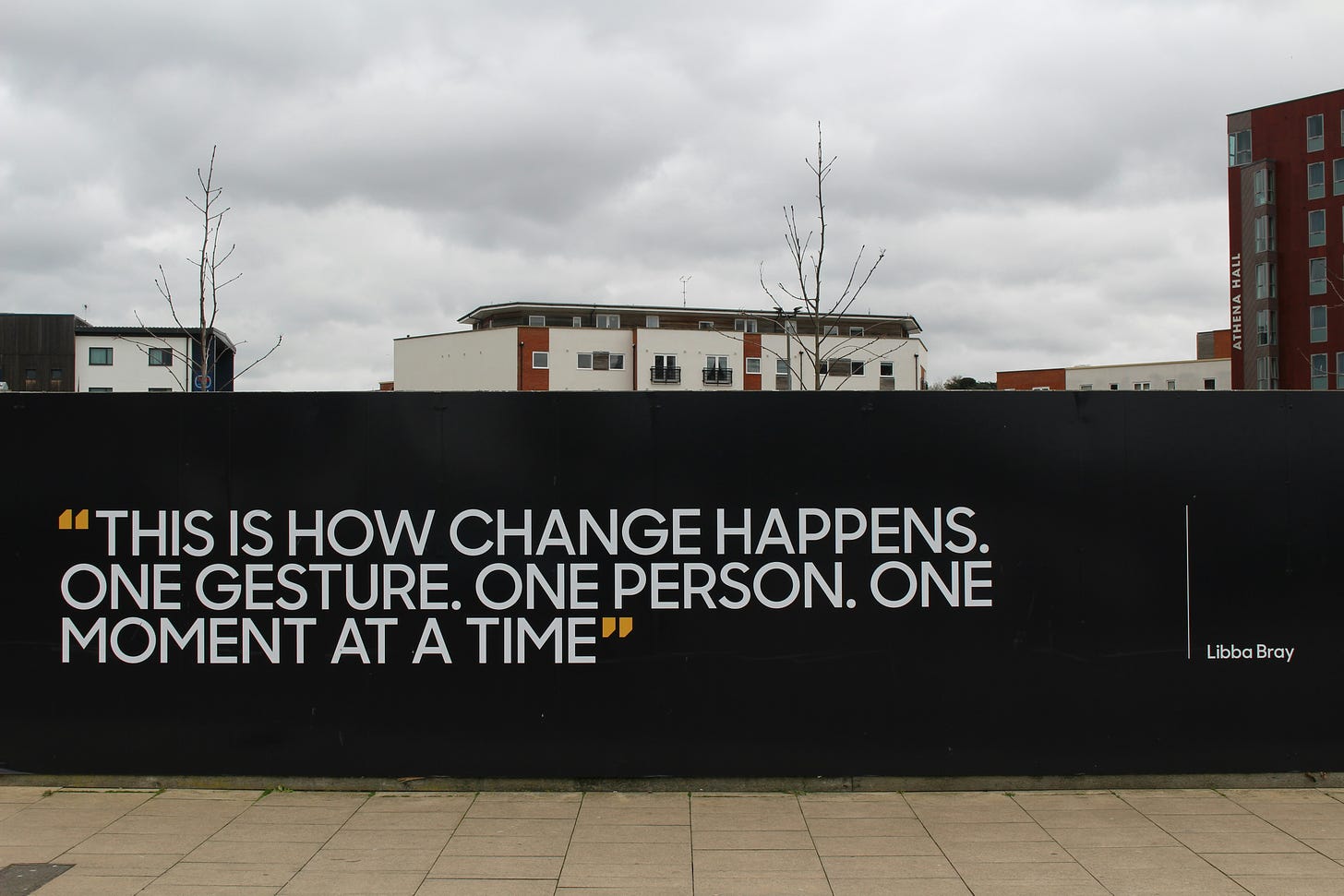 quote on wall: this is how chance happens. one gesture. one person. one moment at a time. libba bray.