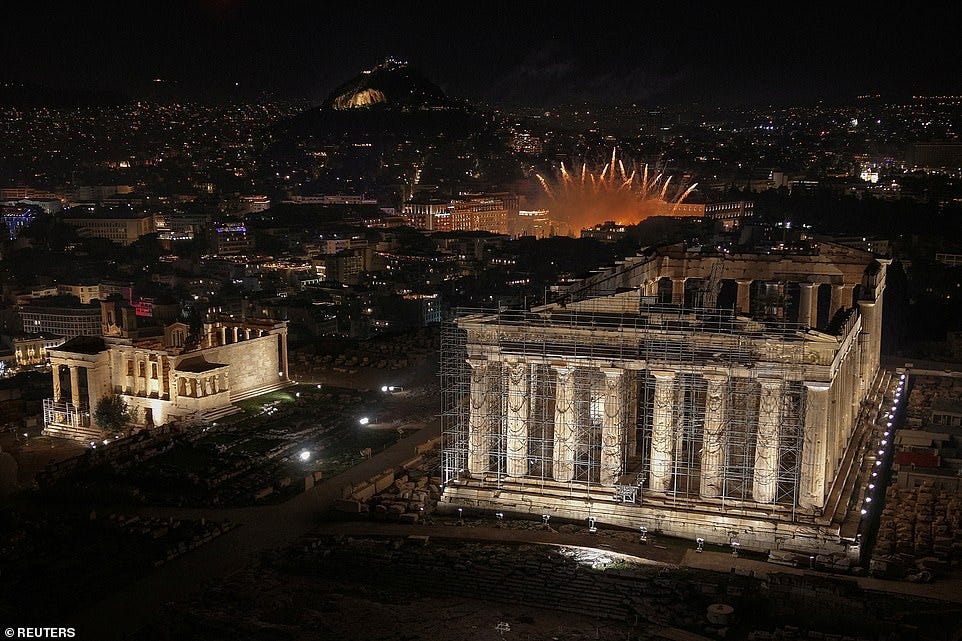ATHENS: A drone view shows fireworks exploding behind the ancient Parthenon temple atop the Acropolis hill during New Year's celebrations, in Athens, Greece, January 1, 2025