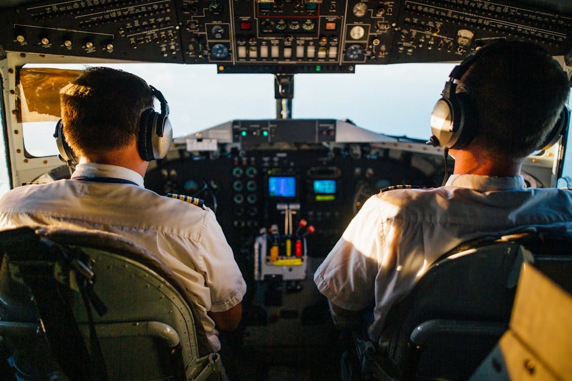 Free Two Pilots Flying an Airplane Stock Photo