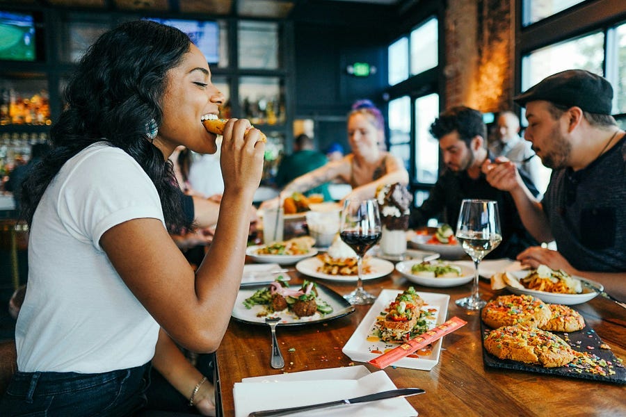 People dining out in a restaurant.