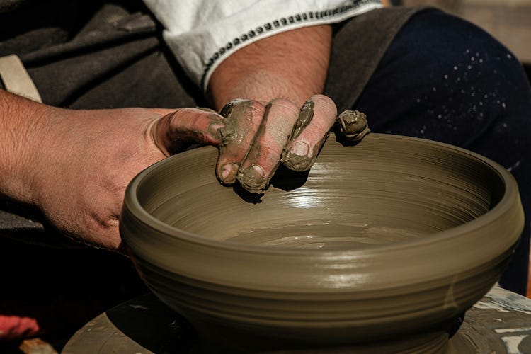 potter making pottery