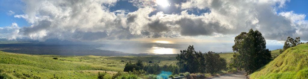 The setting sun from the hills above Kamuela, Hawai'i. A panorama shot taken in 2018 on my iPhone 10. Hawai'i, in all its beauty, is where my mind goes when I think about resorts. If dreams and writing must converge, this is where I'd hope to be.