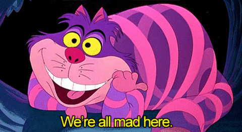 a moving gif from the movie Alice In Wonderland with the pink chesire cat saying "we are all mad here"