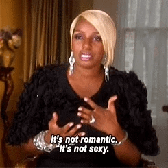 gif of woman shaking her head and saying it's not romantic, it's not sexy
