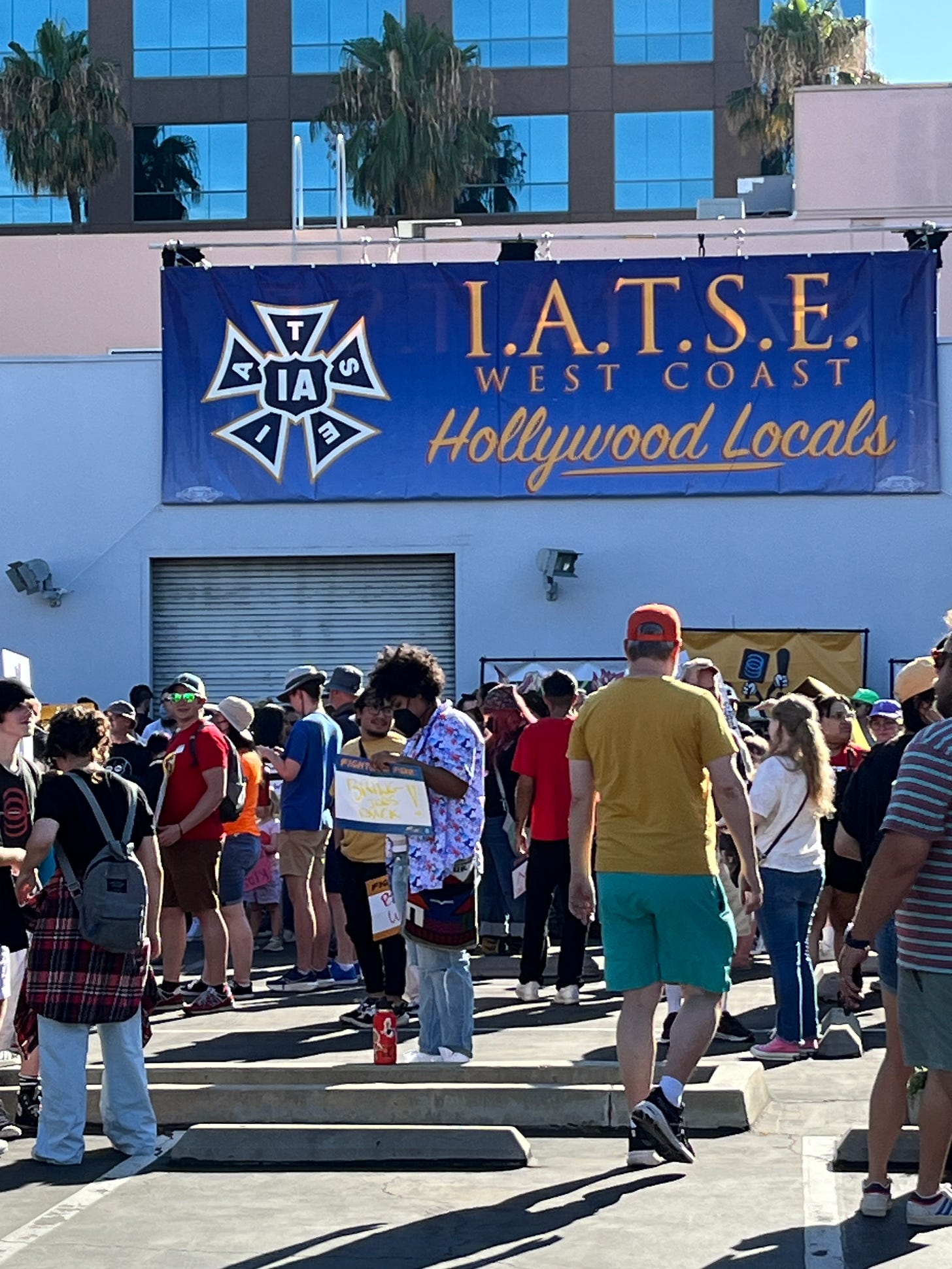 IATSE banner on the side of a building.