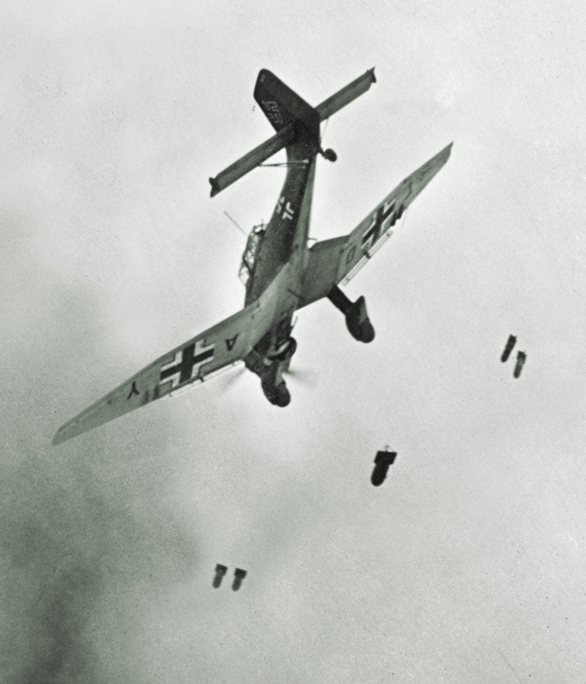A Stuka drops its payload over France in 1940. To attack, pilots would fly directly over a target and rotate the plane onto its back before diving. (Roger Viollet/Getty images) A Stuka drops its payload over France in 1940. To attack, pilots would fly directly over a target and rotate the plane onto its back before diving. (Roger Viollet/Getty images)