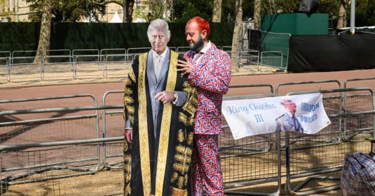 A man stands with a cardboard cut-out of King Charles III in London, England. Photo: Leon Neal/Getty Images. Source: Getty Images