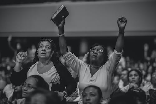 Free Grayscale Photography of People Worshiping Stock Photo