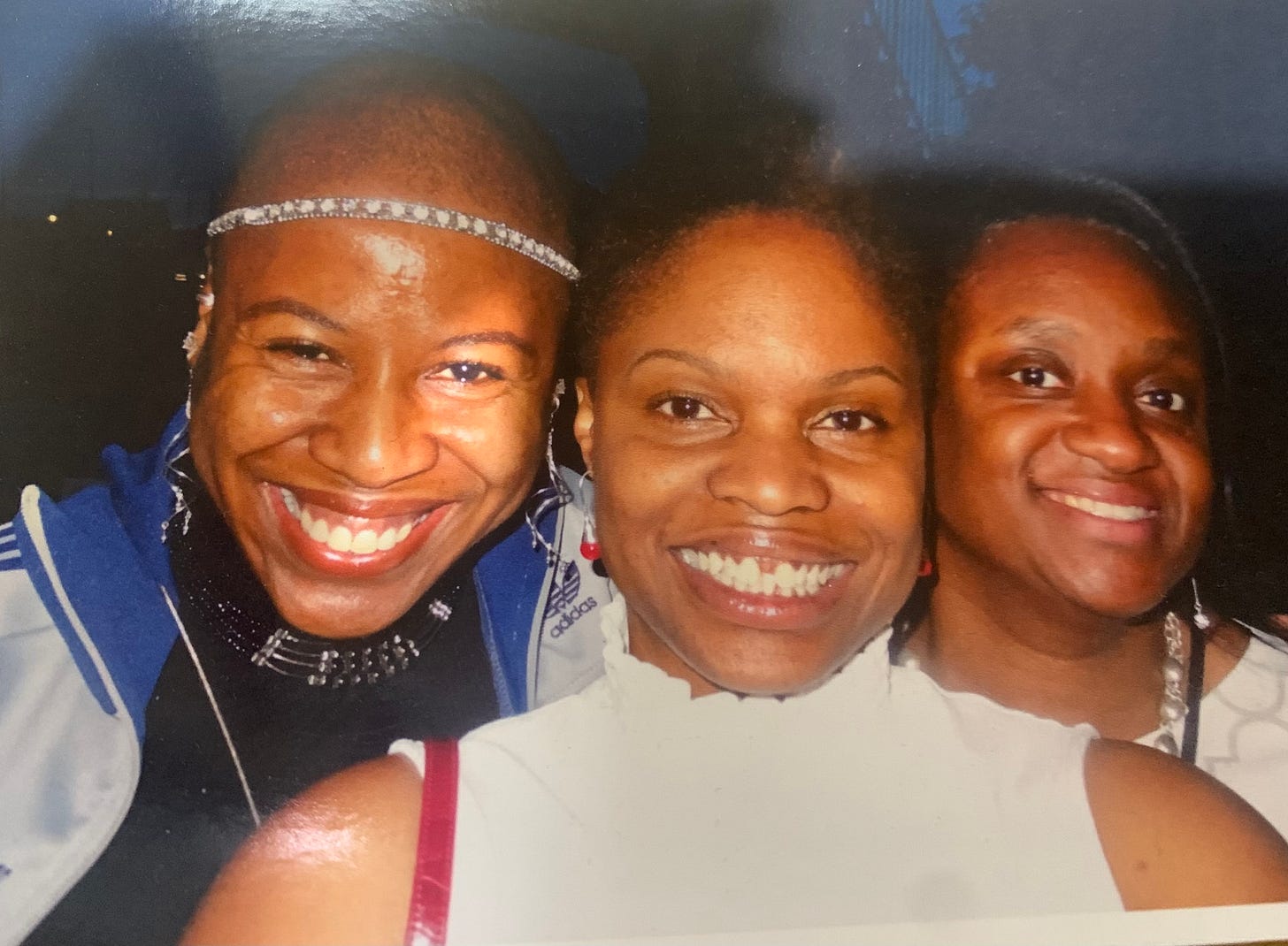 Three smiling Black women