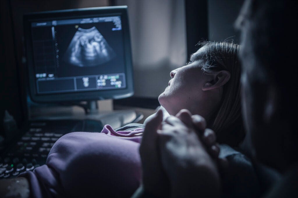 Pregnant woman during a sonogram