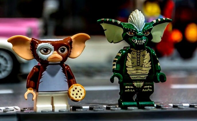 a group of toy figurines sitting on top of a table
