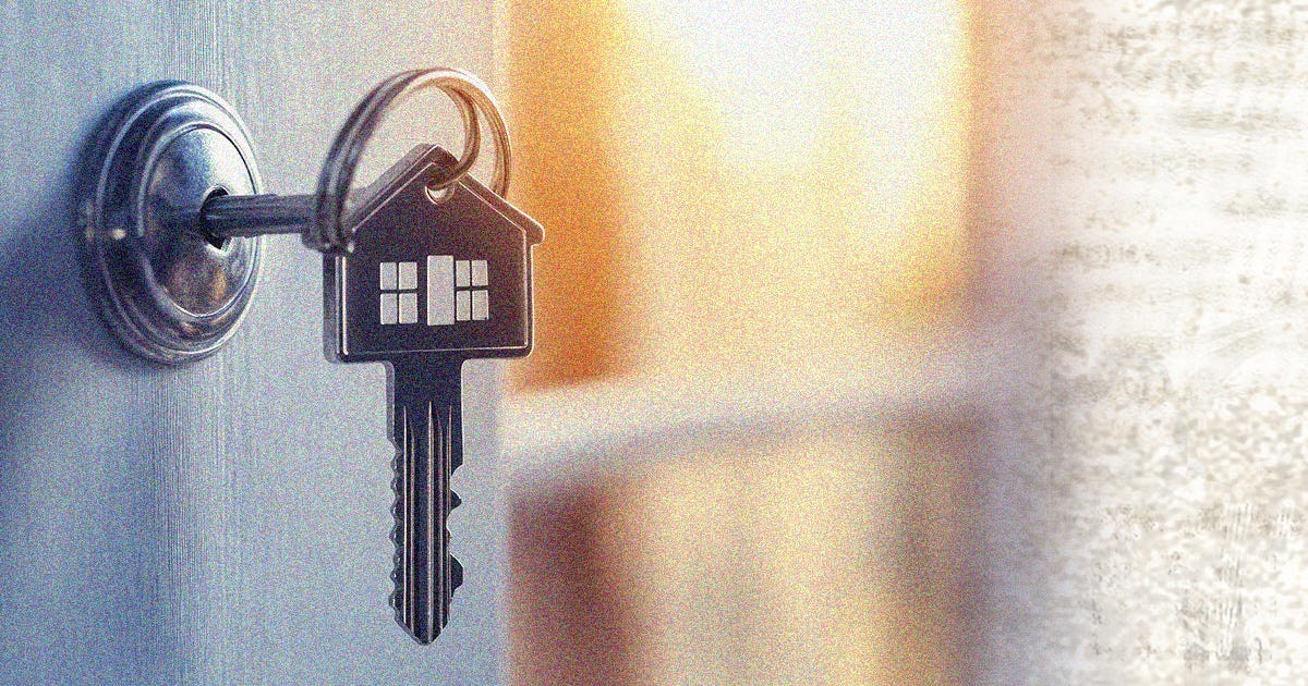 Digitally manipulated photo of a key with a grip shaped like a house opening the lock in a door. The open door glows invitingly.