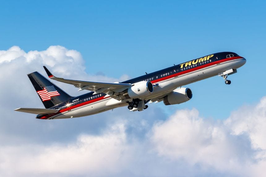 Donald Trump's Boeing 757 flying in the sky.