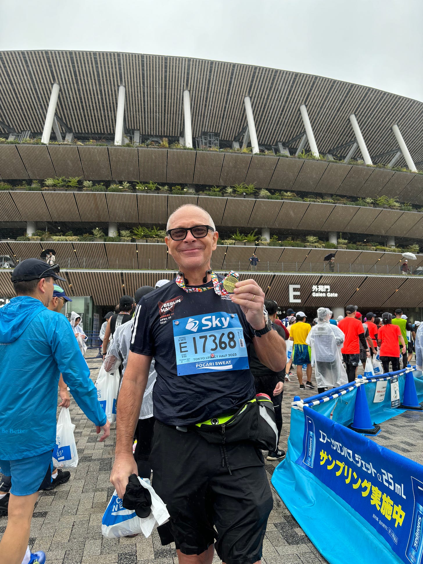 Tokyo Legacy Half Marathon medal in hand