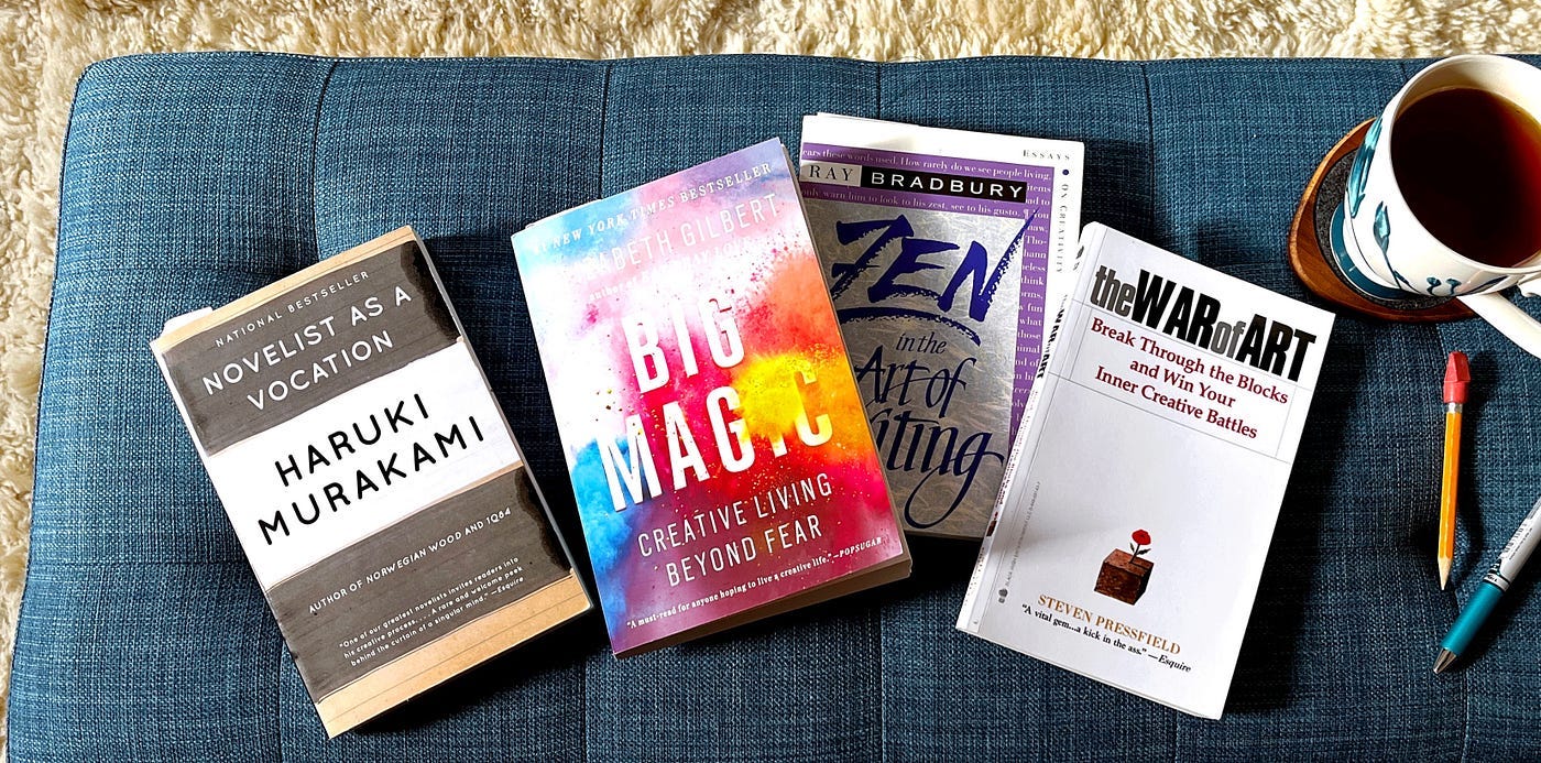 Books on a bench: Novelist as a Vocation by Haruki Murakami, Big Magic, Zen and the Art of Writing by Ray Bradbury, The War of Art by Steven Pressfield