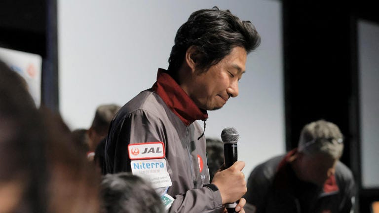 Takeshi Hakamada, CEO of Japanese firm ispace, bows after explaining that the communication of the Hakuto-R Mission 1 lander developed by ispace has been cut off, in Tokyo on April 26, 2023. ((Photo by STR/JIJI Press/AFP via Getty Images))