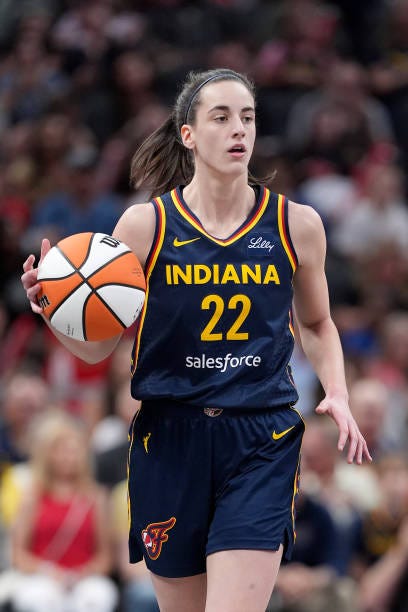 Caitlin Clark of the Indiana Fever dribbles the ball during a game against the Chicago Sky at Gainbridge Fieldhouse on June 16, 2024 in Indianapolis,...