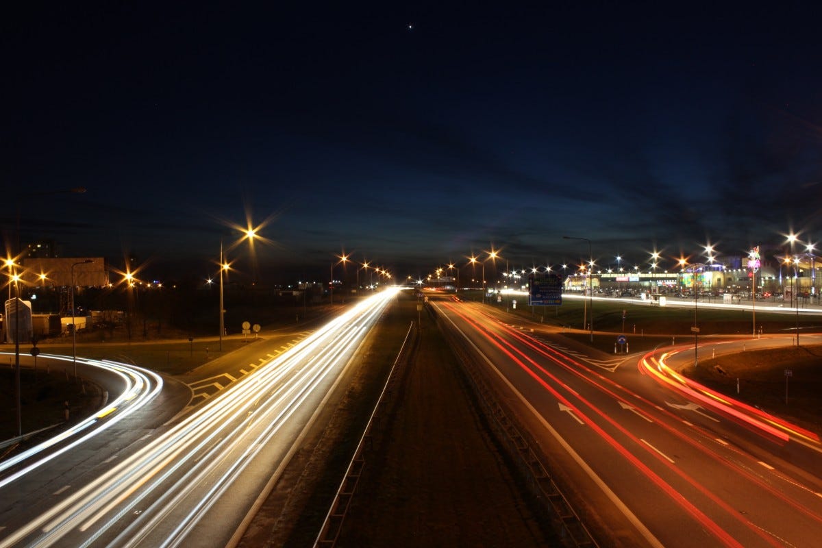 light, blur, road, bridge, traffic, night, highway, driving, city, urban, asphalt, cityscape, travel, freeway, motion, dusk, transportation, evening, direction, darkness, street light, speed, lighting, speedway, infrastructure, interstate, motorway