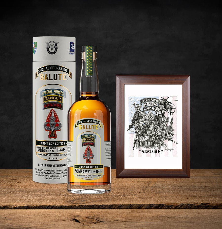 A bottle of Salute whiskey, complete with a tube and a framed drawing of special forces, rangers, and airborne.