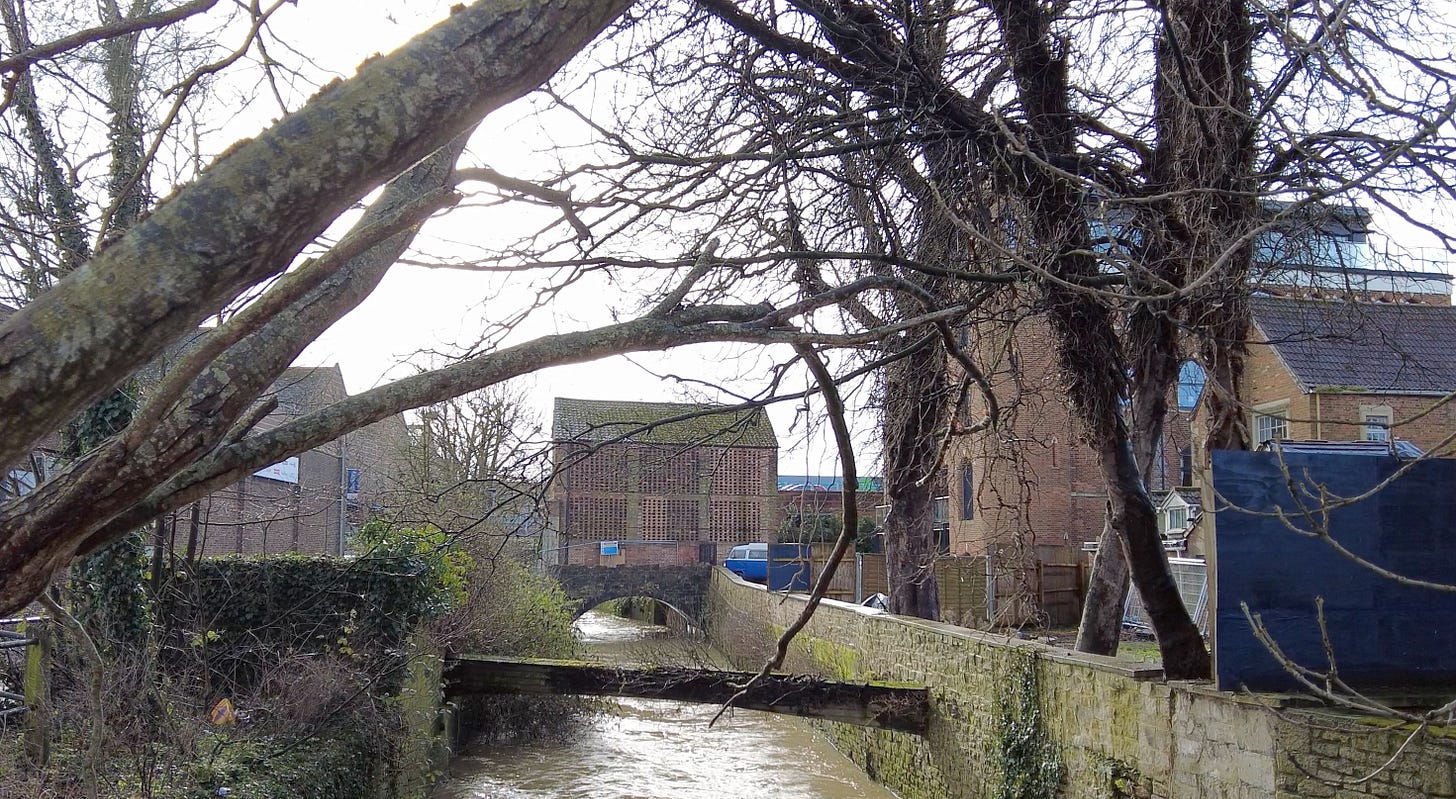 Handle House spanning the River Biss as it flows through Trowbridge, Wiltshire  Image: Roland Millward