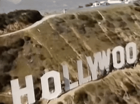 Helicopter shot of the Hollywood sign - a fast-moving animated gif