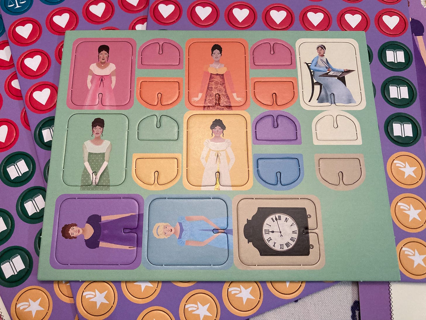 Game figurines for "The Jane Austen Game."