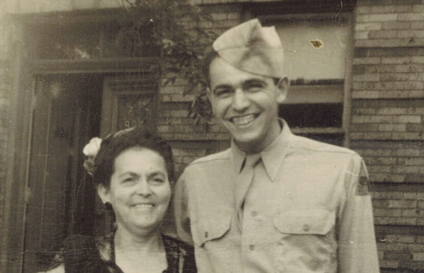 A picture of Irv in uniform next to his mom, circa 1944/45