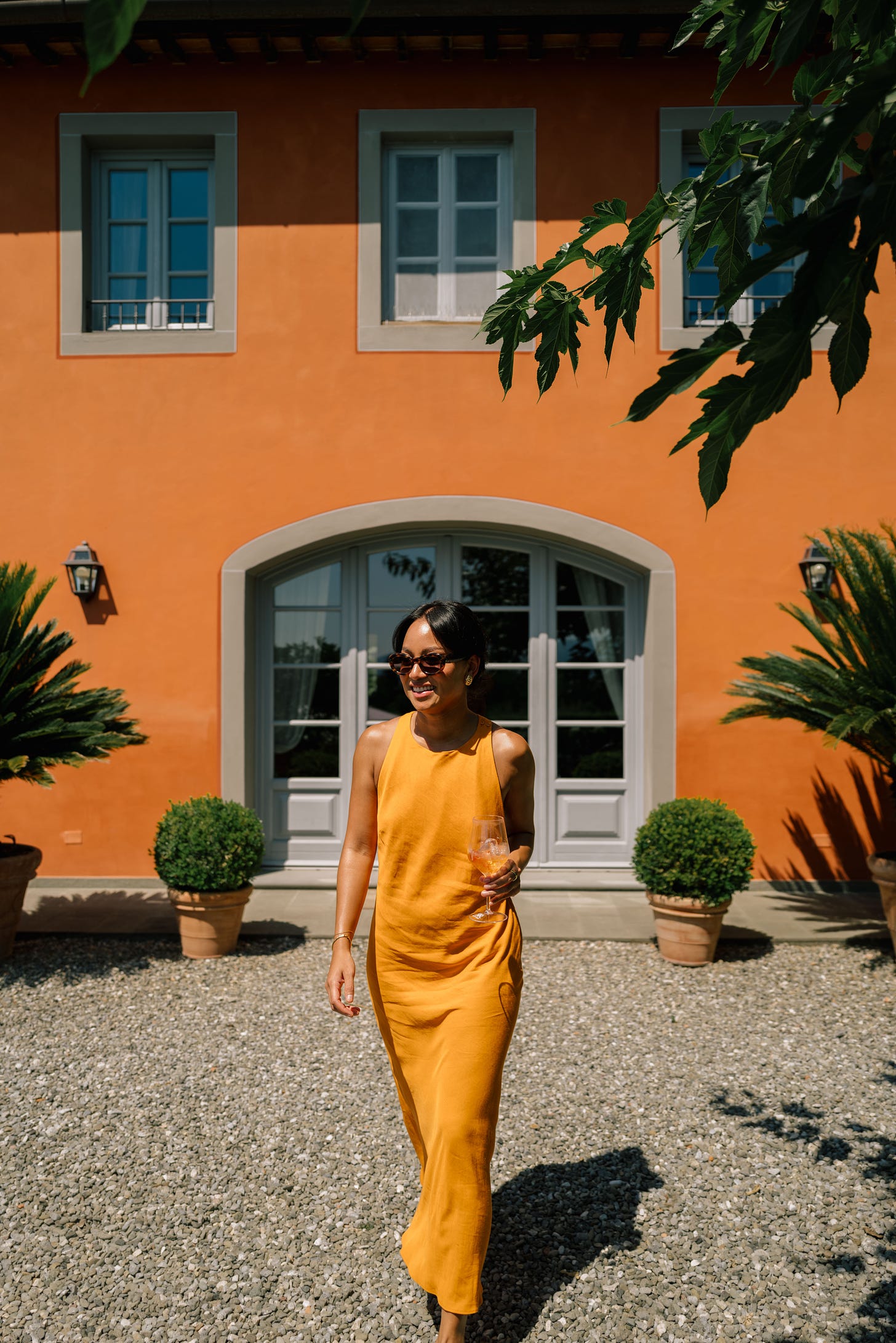 travel photographer Laura Saur on an orange background