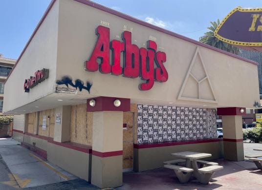 A boarded-up Arbys restaurant in Los Angeles, California