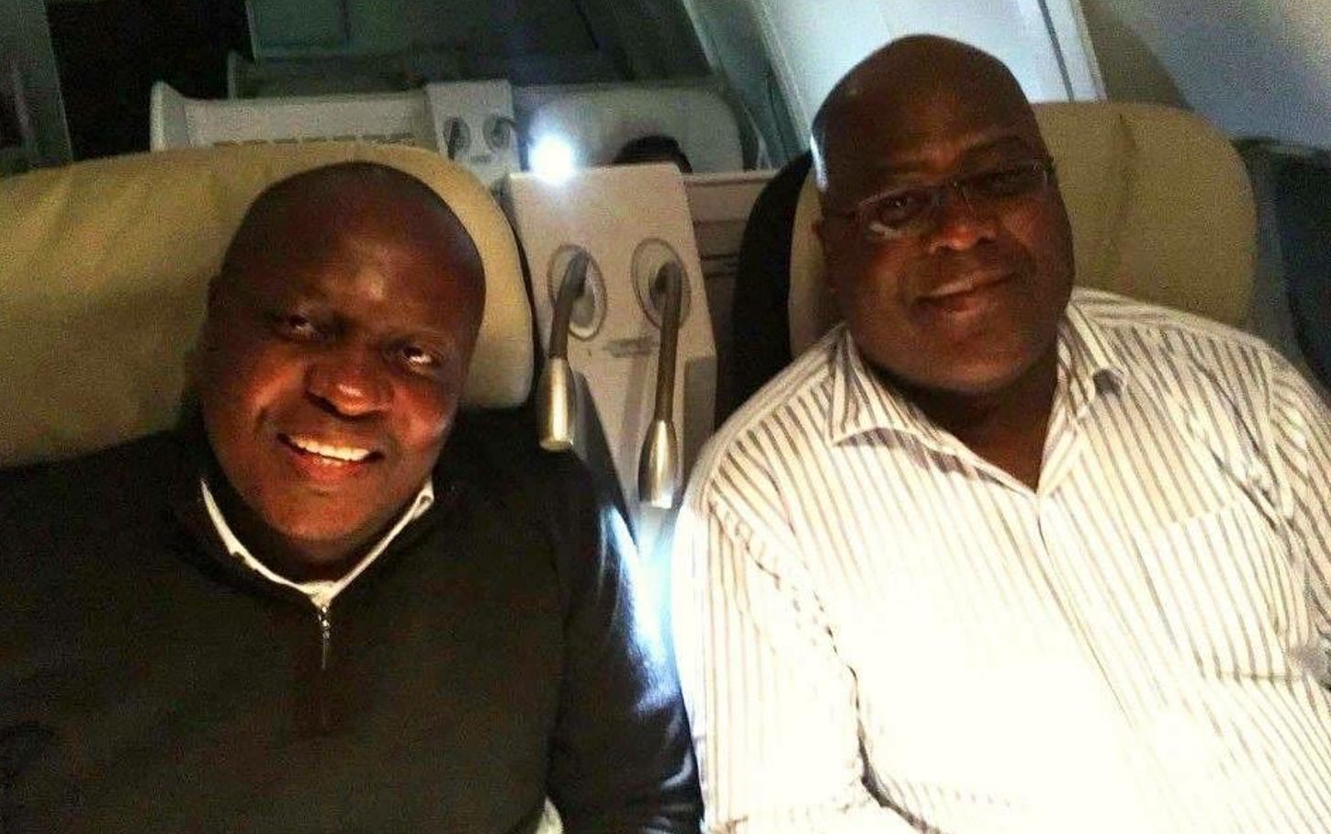 a photo of Marius Mihigo on a plane with the DRC President