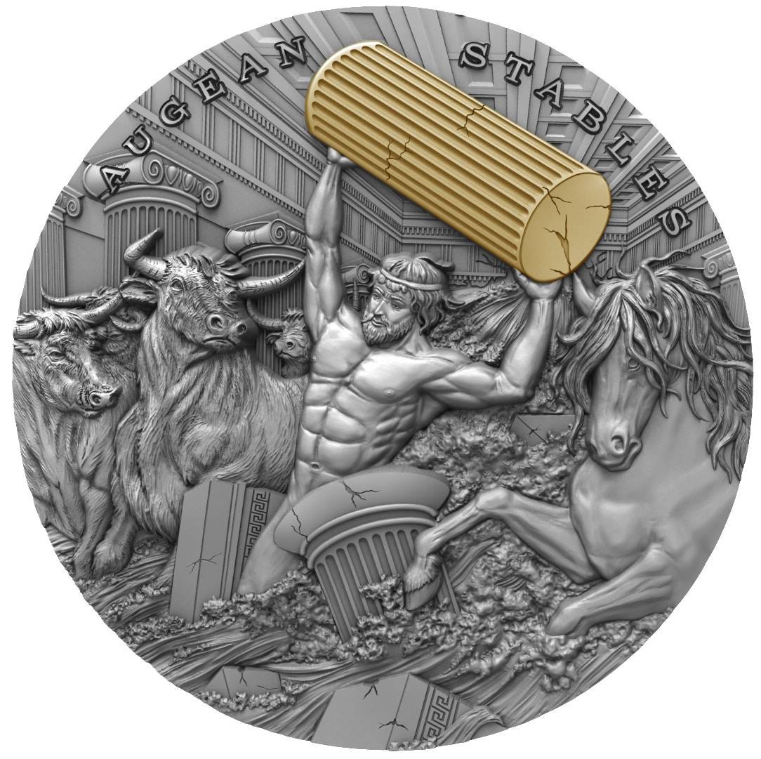 An antique silver 2 oz. coin with gold plating issued in 2021, portraying one of the twelve labors of Hercules, the Augean Stables, with Hercules carrying a golden pillar aloft past mares and cattle through a flood