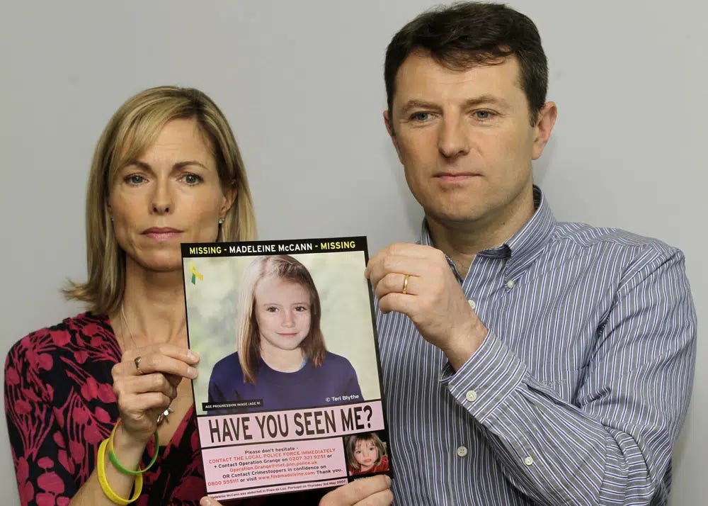 FILE - Kate and Gerry McCann pose for the media with a missing poster depicting an age progression computer generated image of their still missing daughter Madeleine during a news conference in London, May 2, 2012. Portuguese police say they'll resume searching for Madeleine McCann, the British toddler who disappeared in the country’s Algarve region in 2007, in the next few days.Portugal's Judicial Police released a statement confirming local media reports that they would conduct the search at the request of the German authorities and in the presence of British officials. (AP Photo/Sang Tan, File)