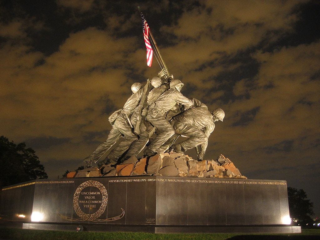 The USMC Memorial pictured at night.