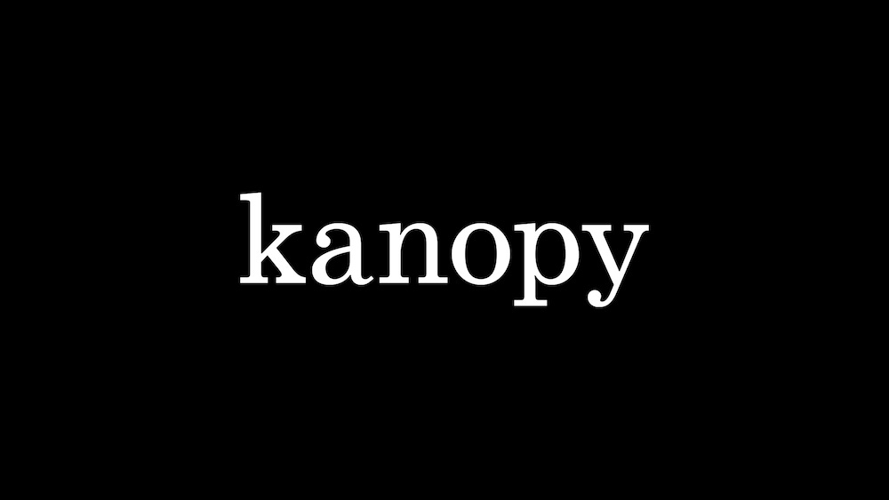 White Kanopy logo on a black background
