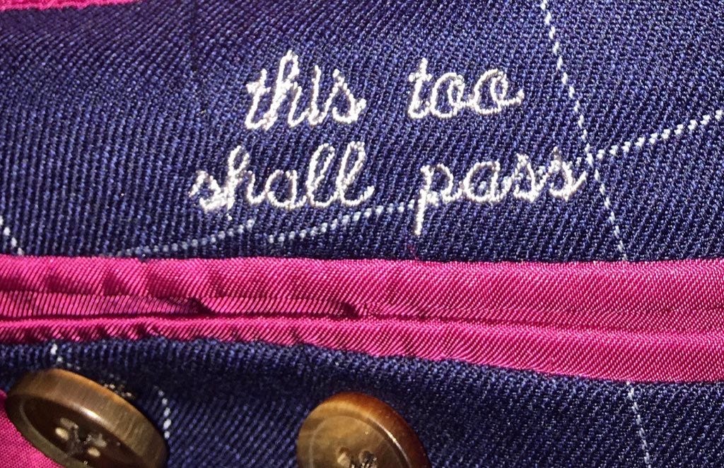 Dr. Owen Scott Muir's Jacket has a photo of "this too shall pass" stitched inside